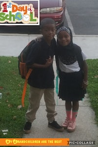 a boy and a girl posing for a picture